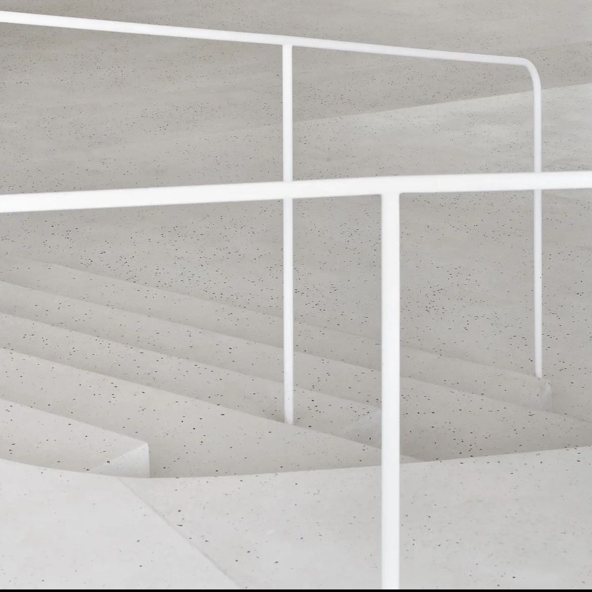 Escalera minimalista en terrazo continuo Stone Feel blanco